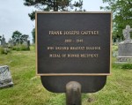 A gravestone plaque honoring Frank Joseph Gatzke, who lived from 1887 to 1944, mentioning his military service during World War II and his role in the Boy Scouts.