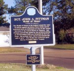 Historical marker dedicated to Sgt. John A. Pittman, Medal of Honor recipient, detailing his service and the significance of the honor.