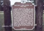 Historical marker for Mitchell Red Cloud Jr. in Kenosha, WI, detailing his life and contributions.
