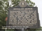 Historical marker for Andrew Jackson Smith, detailing his Medal of Honor awarded for bravery during the Civil War and his burial information.