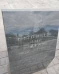 Close-up of a memorial stone honoring Sgt. Frederick E. Toy, U.S. Army, with engraving details.